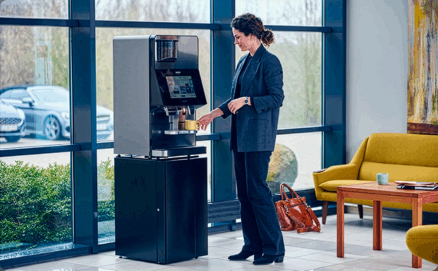 Woman using GS MaserBrew in office in California